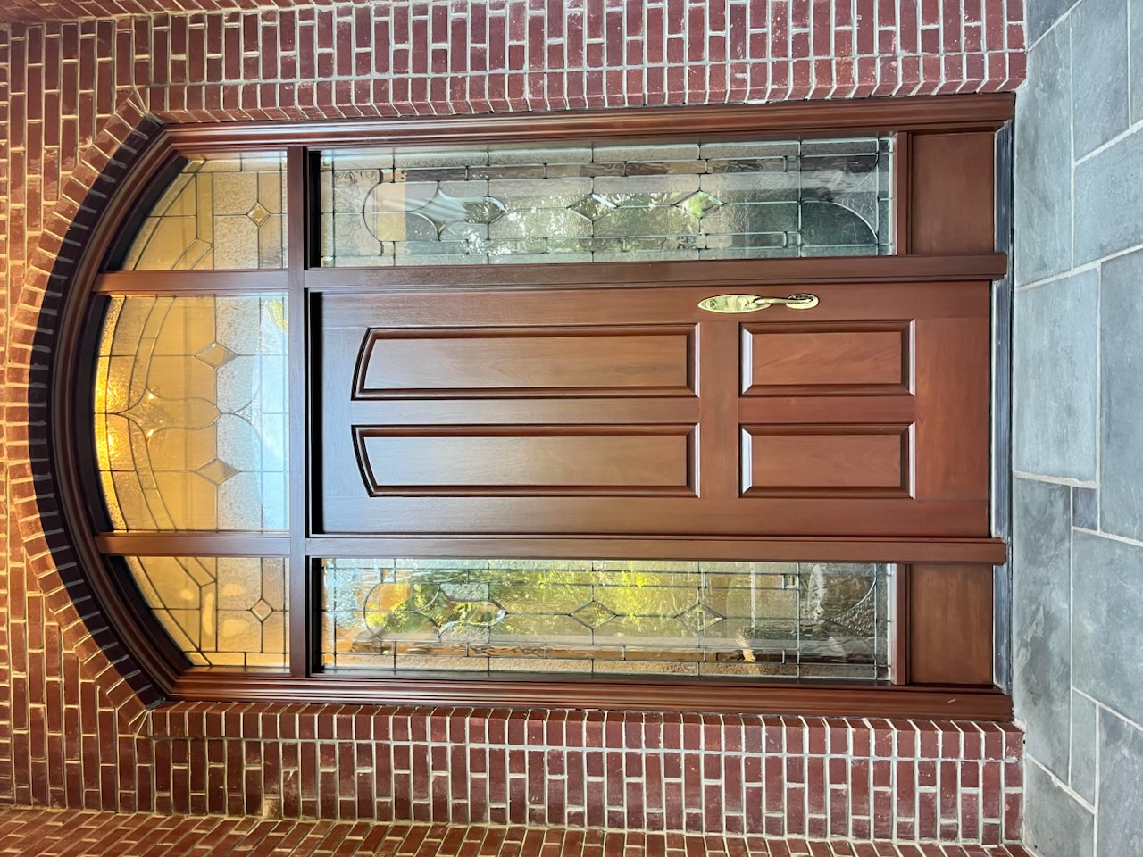 Beautiful front entry door stripped and refinished in Indianapolis Indiana  Thumbnail