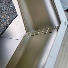 Properly-installed-gutters-and-gutter-covers-in-valleys-or-high-water-volume-areas-in-Indianapolis 1